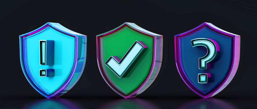 Three shield symbols featuring a question mark and an exclamation mark, representing risk management for forex traders' success.